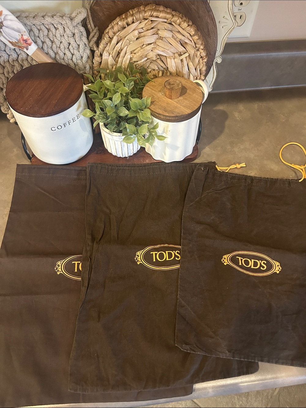 Set of 3 Tod’s drawstring dust bags.